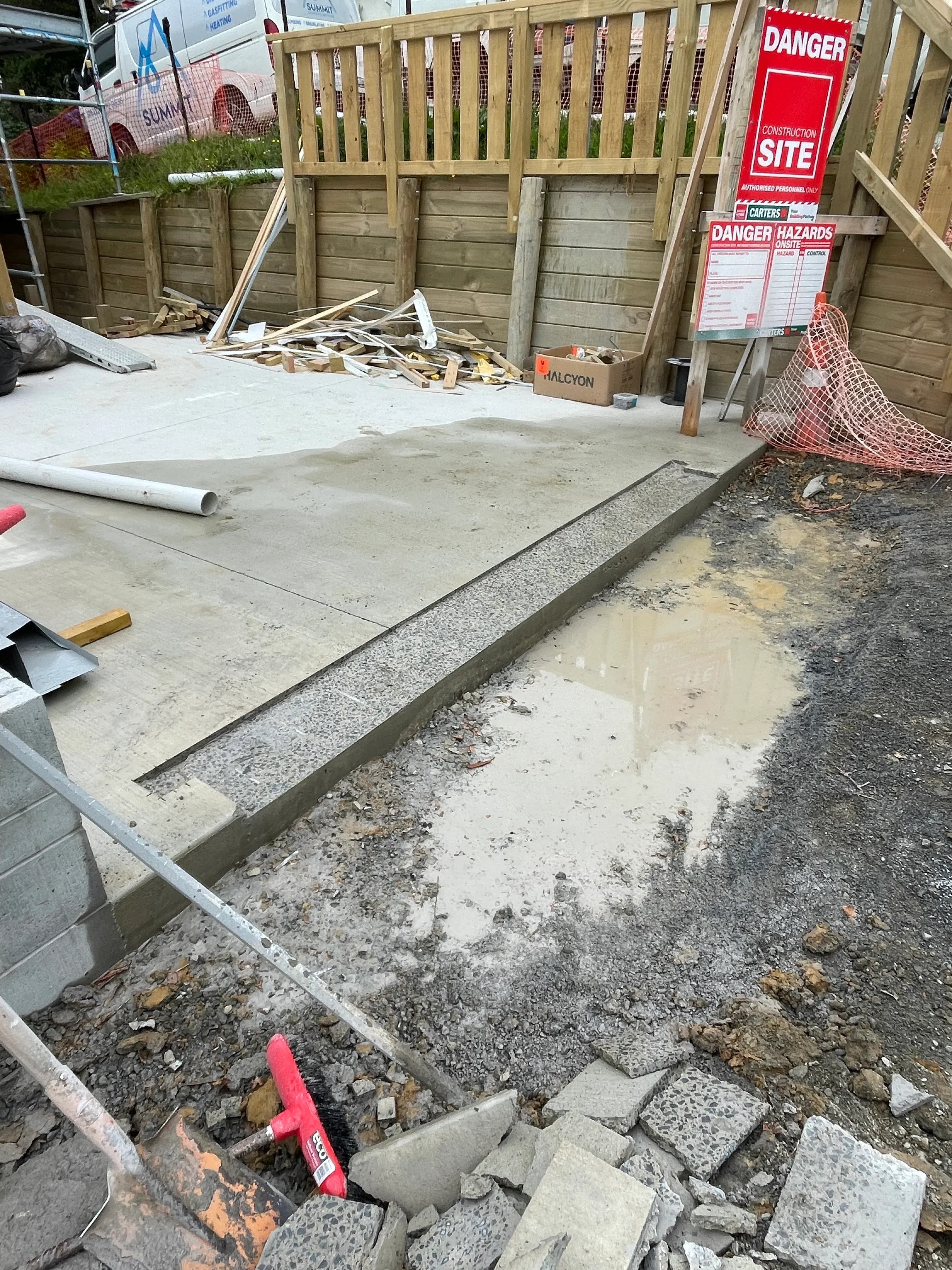 Door rebate cut into concrete frame