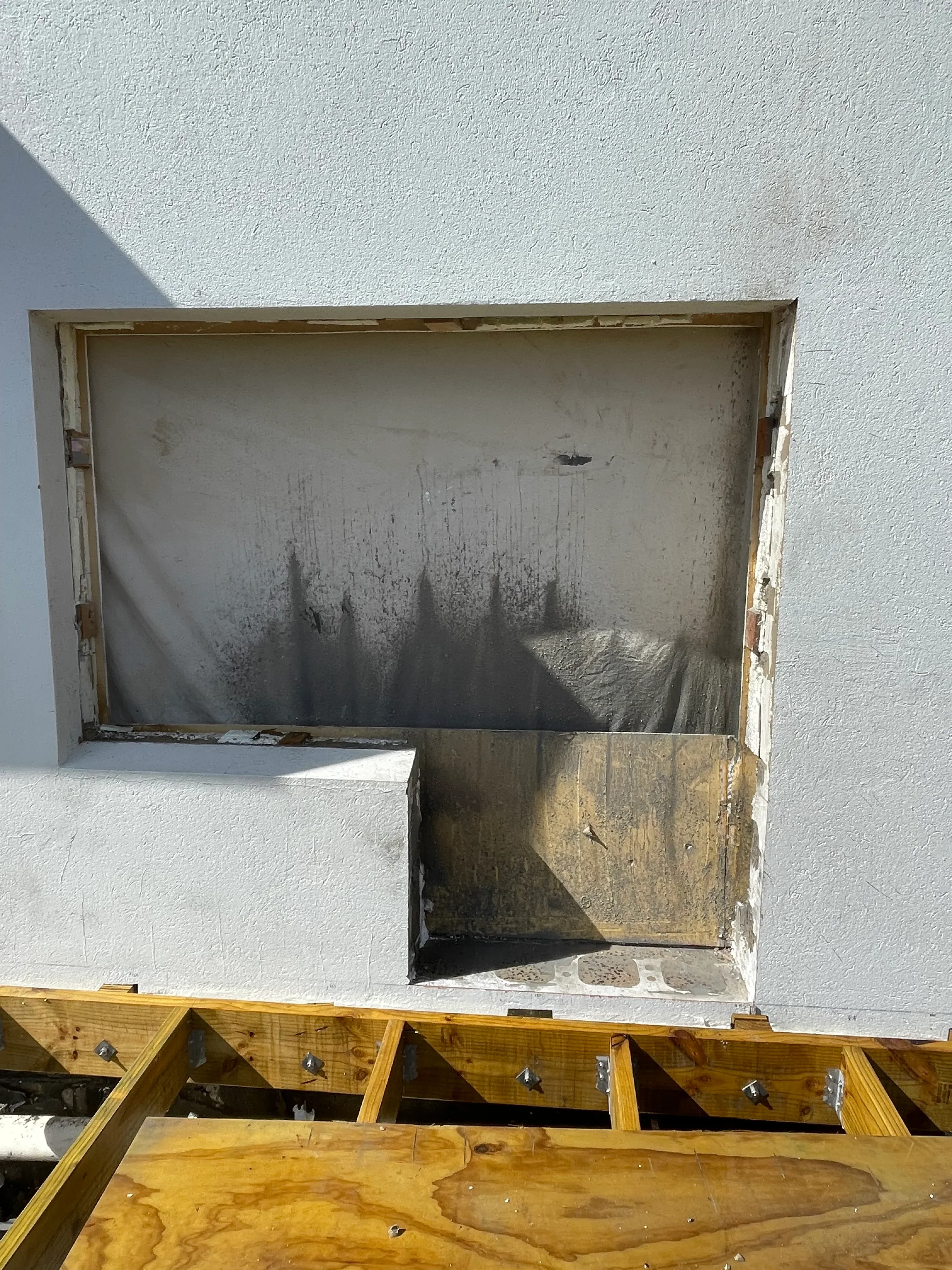 Window opening cut into concrete wall